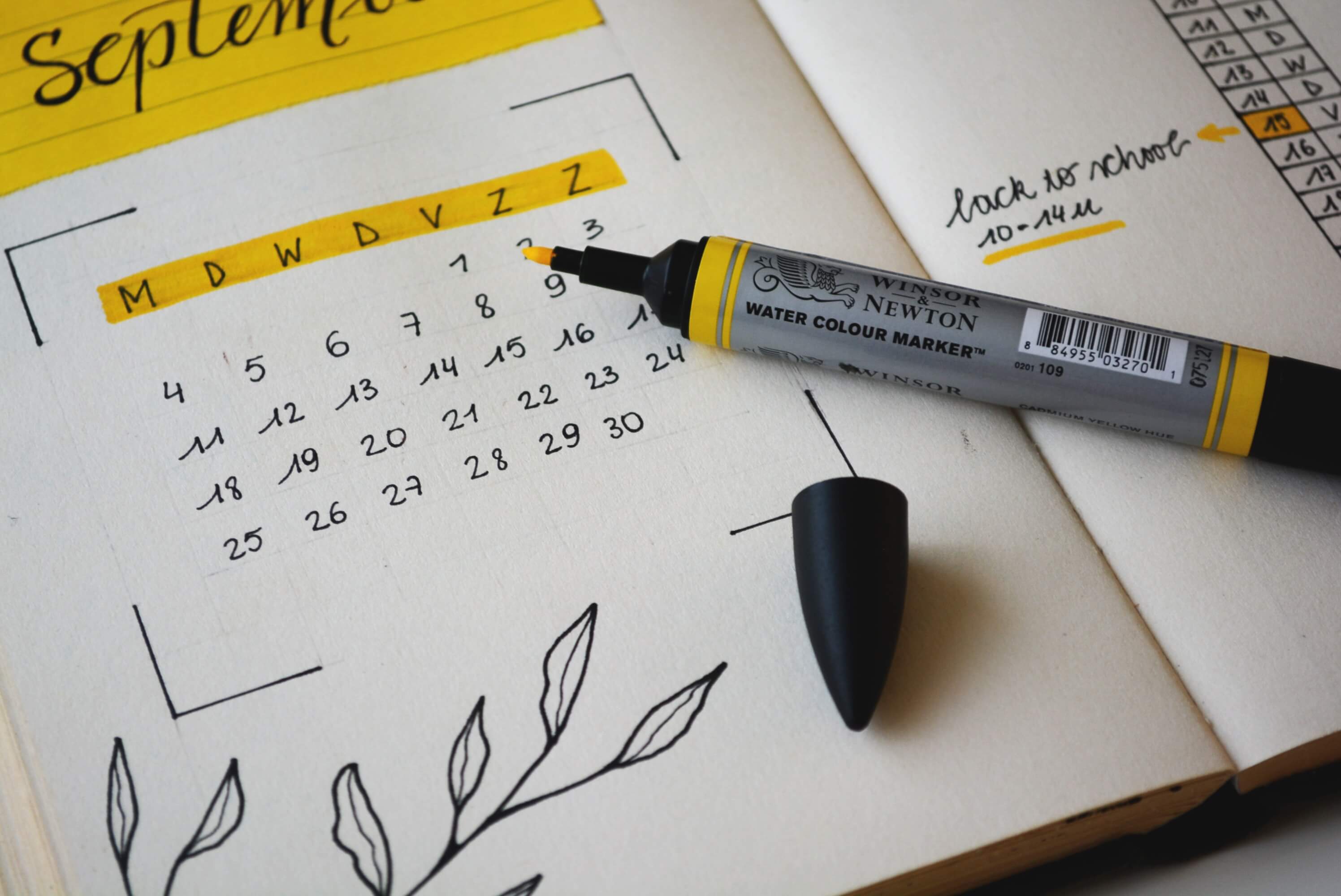 handwritten calendar with yellow marker